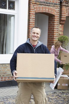 Man and van moving furniture in St Johns Wood residential street