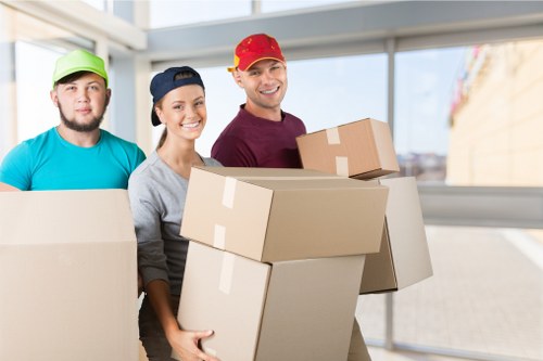 Removal company team preparing items for a booked move