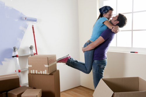 Professional removal team moving household items in St John’s Wood