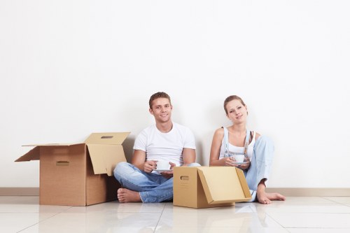 Packed moving boxes and protective materials ready for a local house move