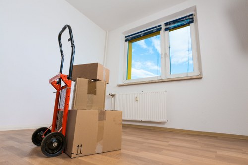 Office desks and boxes arranged for a commercial relocation in St Johns Wood